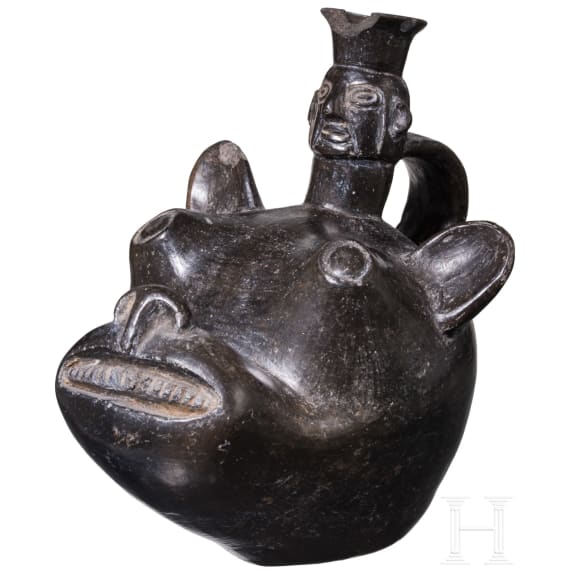 A Peruvian animal-head shaped blackware vessel, probably Chimu culture, 11th - 15th century