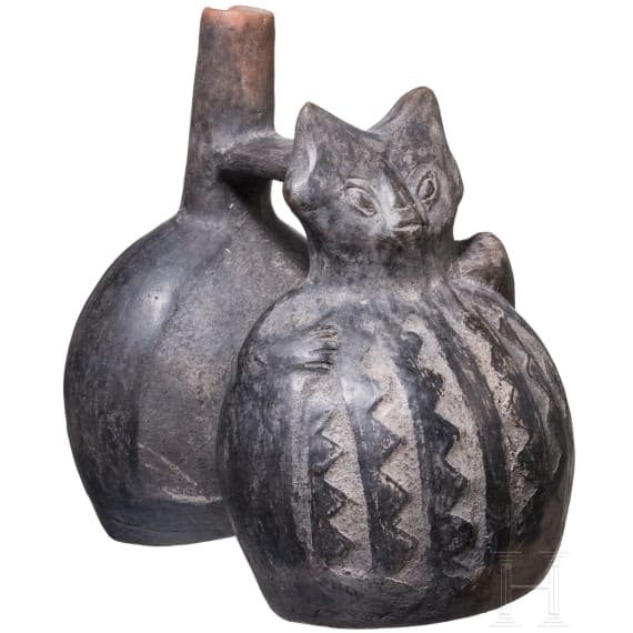 A Peruvian figural clay double-vessel, probably Chimu culture, 11th - 15th century