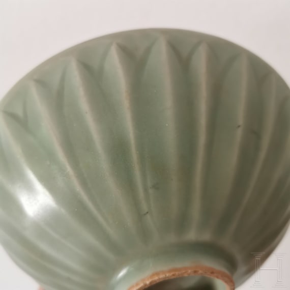 A Chinese Longquan celadon-glazed lotus bowl, probably Yuan or Ming dynasty (14th - 17th century)