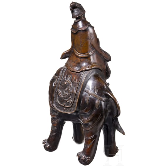 A Japanese bronze of a Kannon on an elephant, Meiji period, circa 1900