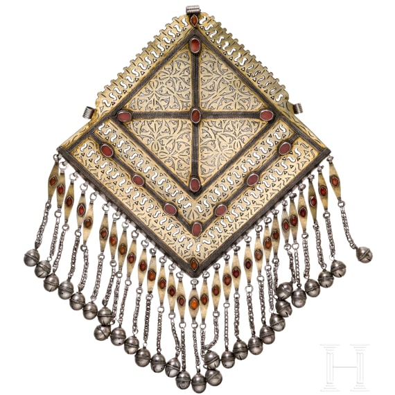 A large, partially gilt Turkmen silver and carnelian Teke pectoral ornament, circa 1900