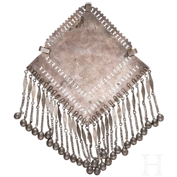 A large, partially gilt Turkmen silver and carnelian Teke pectoral ornament, circa 1900