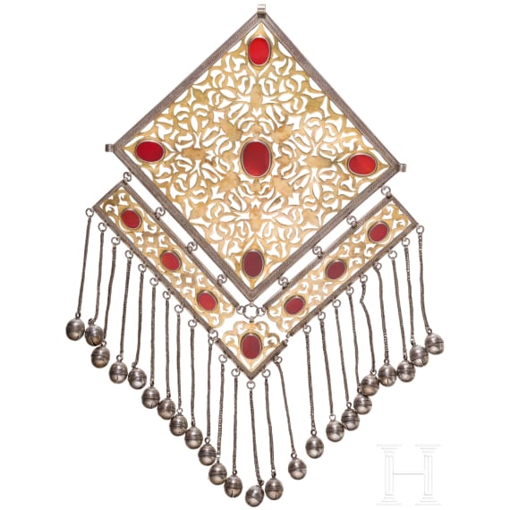 A large, partially gilt Turkmen silver and carnelian Teke pectoral ornament, circa 1900