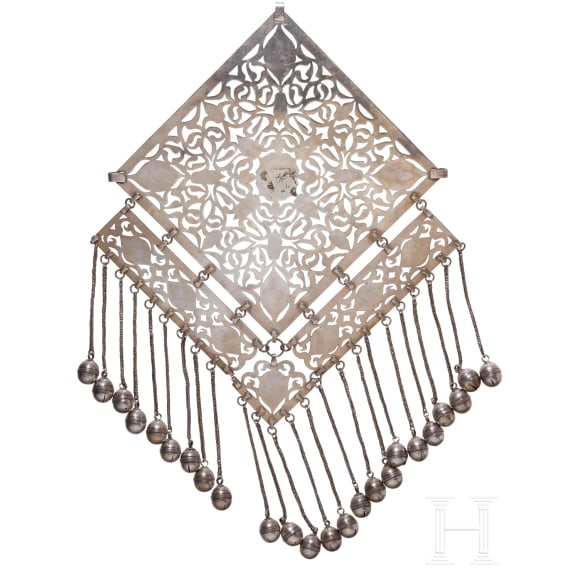 A large, partially gilt Turkmen silver and carnelian Teke pectoral ornament, circa 1900