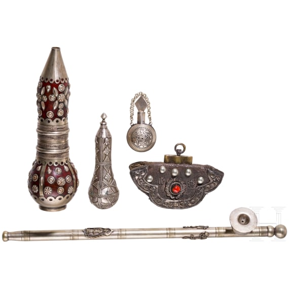 Two silver/silver-mounted lime pots, a silver-mounted leather bag, a plated opium pipe and a plated flask, Indian/Tibetan, circa 1900