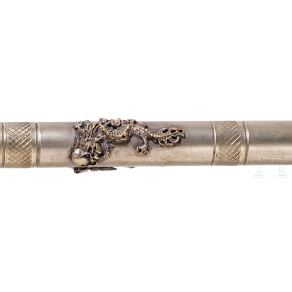 Two silver/silver-mounted lime pots, a silver-mounted leather bag, a plated opium pipe and a plated flask, Indian/Tibetan, circa 1900