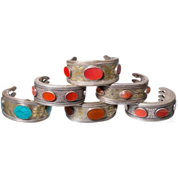 Six fire-gilt Turkmen silver and carnelian Teke bracelets, circa 1900