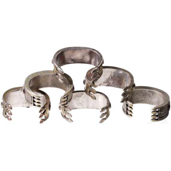 Six fire-gilt Turkmen silver and carnelian Teke bracelets, circa 1900
