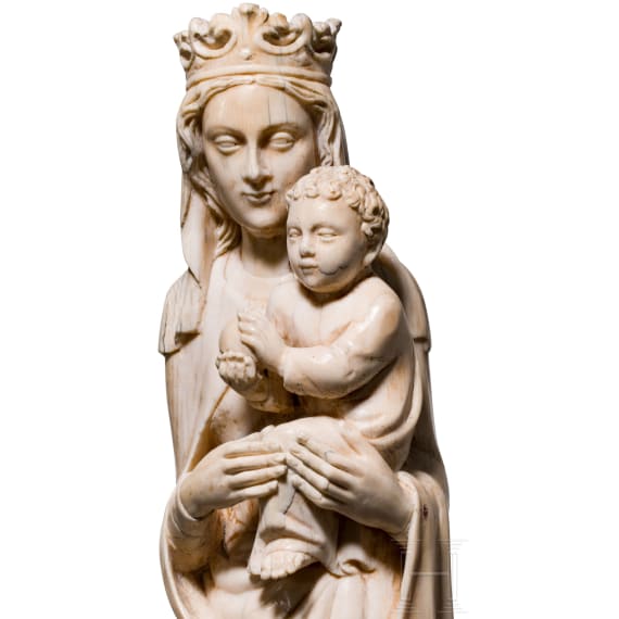 A large ivory figure of the Madonna with the Infant Jesus, probably Dieppe, mid-19th century