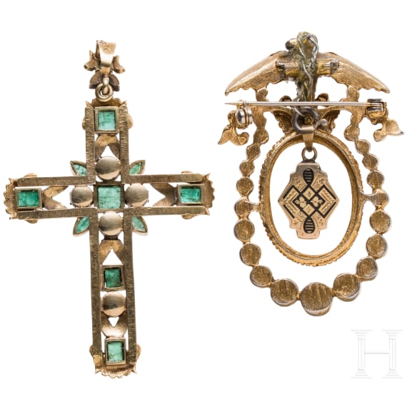 An 18ct gold cross pendant with diamonds (circa 0.56ct) and a gilt brooch with eagle