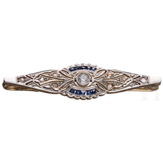 A 18ct gold brooch set with diamonds (ca. 0.24 ct)