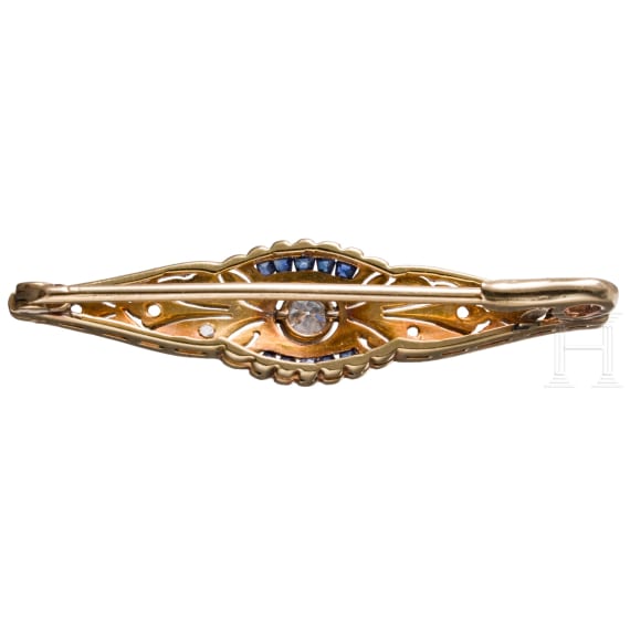 A 18ct gold brooch set with diamonds (ca. 0.24 ct)