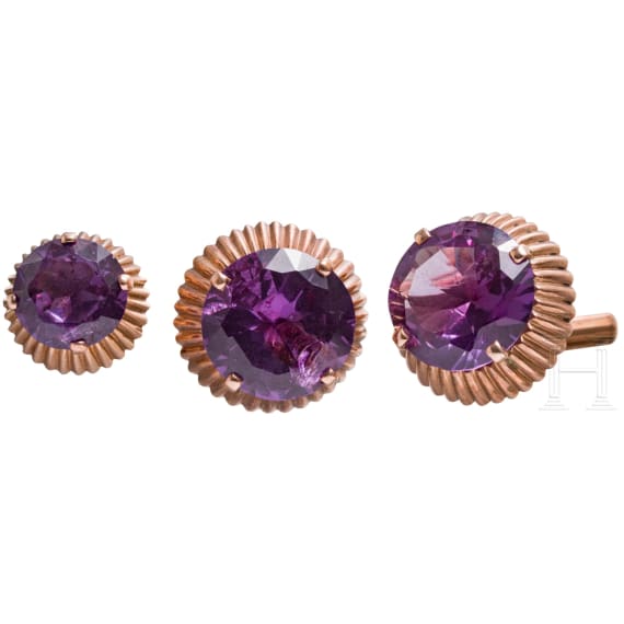 A pair of 14ct gold and amethyst cufflinks and an earring