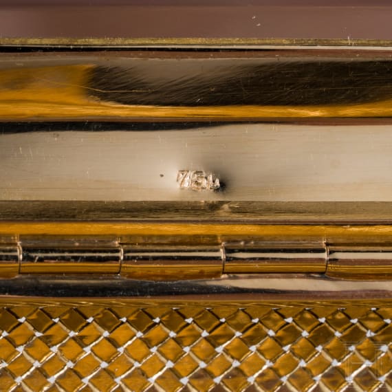 A 18ct gold evening bag and a 18ct gold atomizer, 1950s/60s