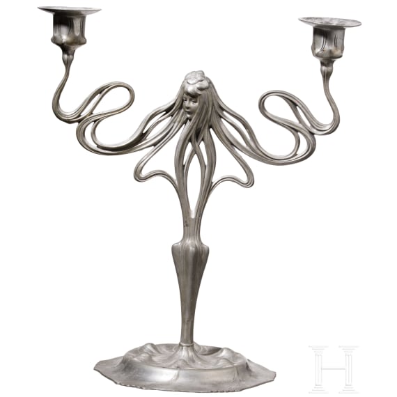 A figural art nouveau pewter candlestick, Cologne, Orivit company, circa 1900