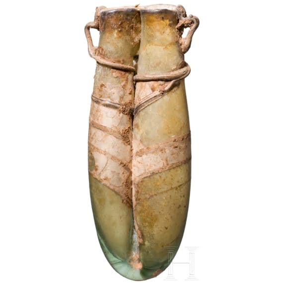 A Roman double glass unguentarium, 100 - 300 A.D.