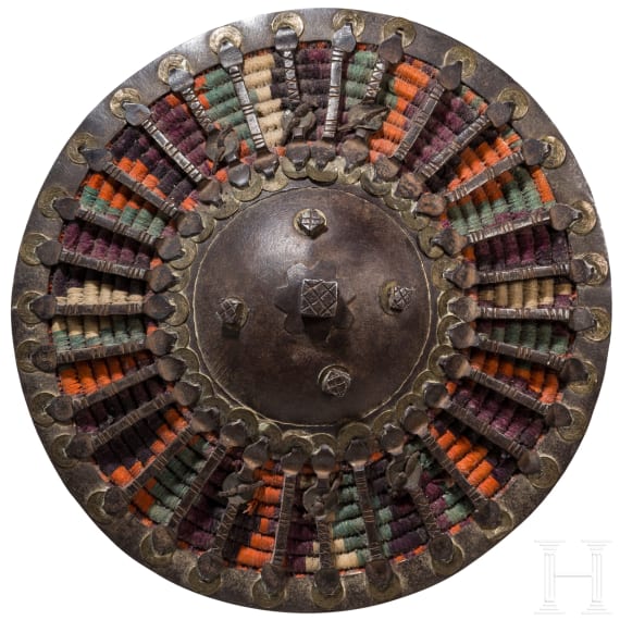 An iron-mounted Caucasian buckler, 19th century