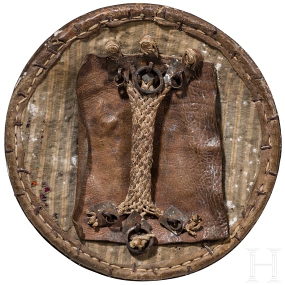 An iron-mounted Caucasian buckler, 19th century