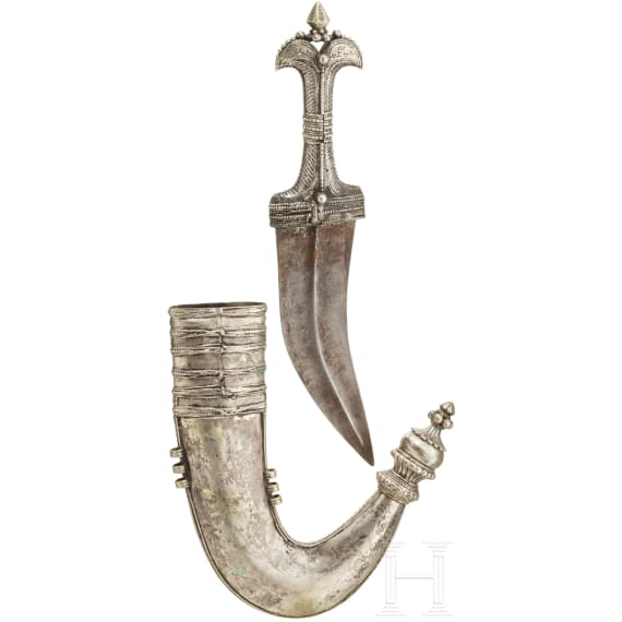 A silver and nickel-silver mounted Yemenite djambia, 20th century