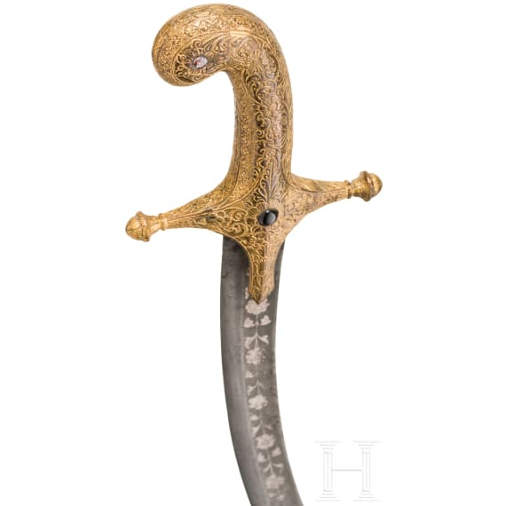 An Indian gilt-copper hilted shamshir, probably Kutch, 19th century