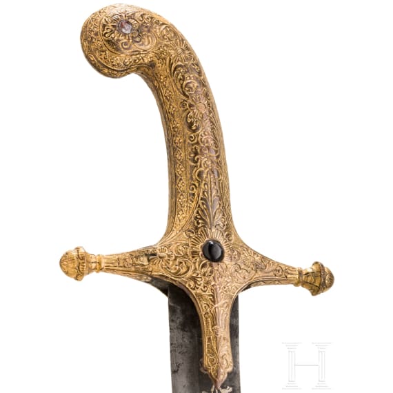 An Indian gilt-copper hilted shamshir, probably Kutch, 19th century