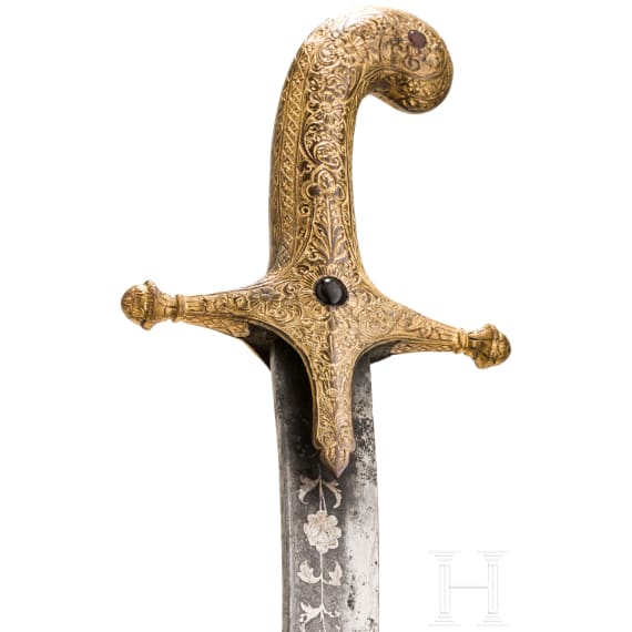 An Indian gilt-copper hilted shamshir, probably Kutch, 19th century
