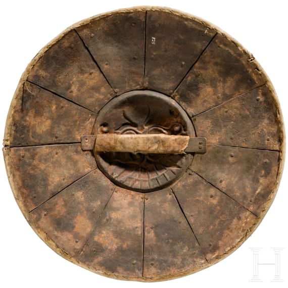 A Tibetan iron round shield, 19th century