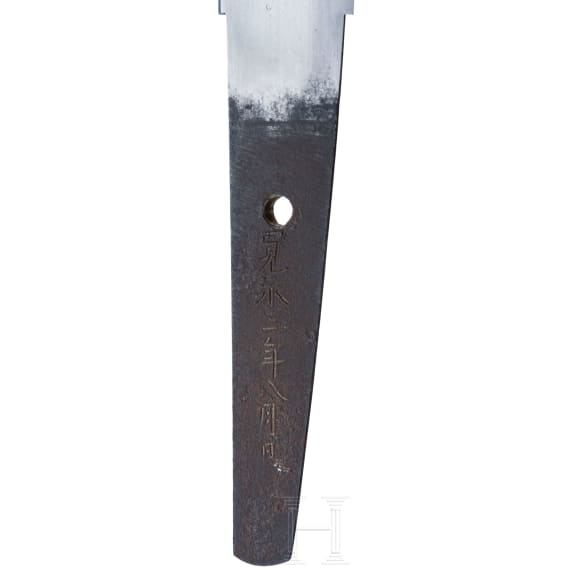 A wakizashi in shirasaya, signed Takahira, dated 1626