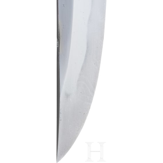 A wakizashi in shirasaya, signed Takahira, dated 1626