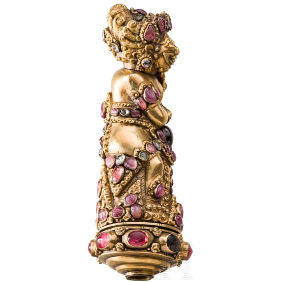 A Bali kris handle in the form of Bataru Bayu with a star sapphire, circa 1900