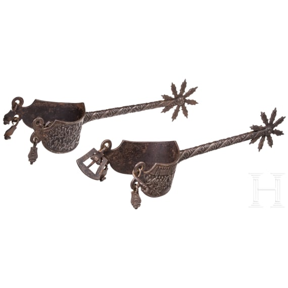 A pair of French rowell spurs in Gothic style with ciseled ornaments, 19th century