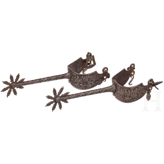 A pair of French rowell spurs in Gothic style with ciseled ornaments, 19th century