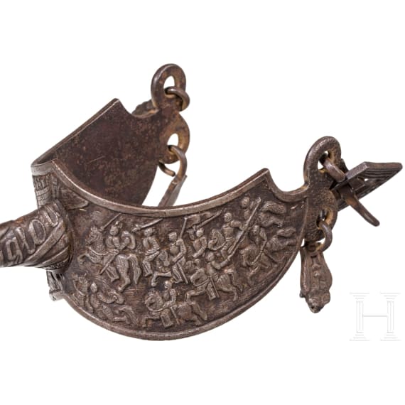 A pair of French rowell spurs in Gothic style with ciseled ornaments, 19th century