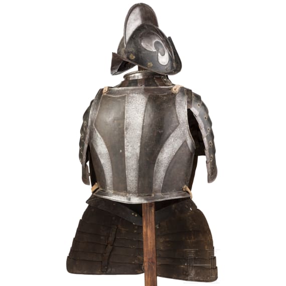 A South German black and white armour for a man-at-arms, circa 1600