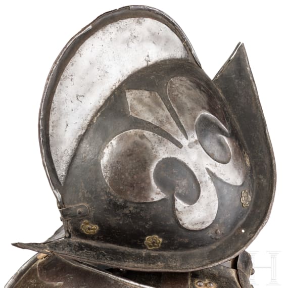A South German black and white armour for a man-at-arms, circa 1600