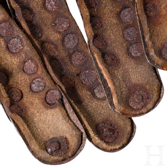 A pair of German armoured gauntlets, circa 1580