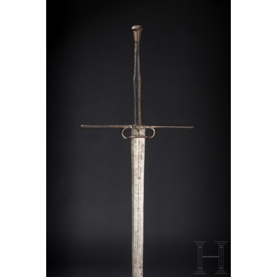 A southern German or Swiss two-handed combat sword with late Gothic blade, circa 1540/50