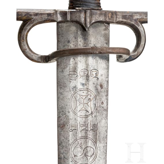 A southern German or Swiss two-handed combat sword with late Gothic blade, circa 1540/50