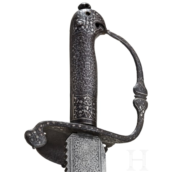 A short English cutlass with silver-damascened hilt, dated 1630
