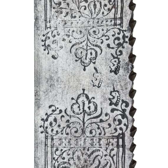 A short English cutlass with silver-damascened hilt, dated 1630