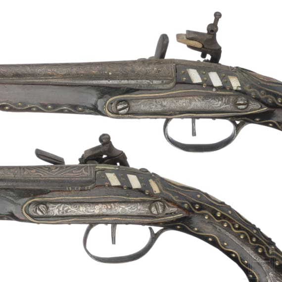 A pair of North African miquelet flintlock pistols, circa 1800
