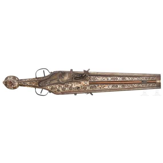 A German Victorian double-barrelled wheelock pistol, in the style of circa 1610