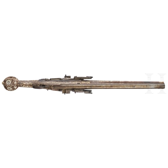 A German Victorian double-barrelled wheelock pistol, in the style of circa 1610