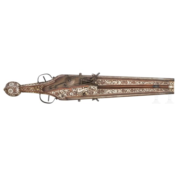 A German Victorian double-barrelled wheelock pistol, in the style of circa 1610