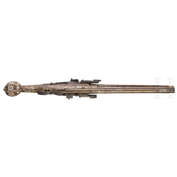 A German Victorian double-barrelled wheelock pistol, in the style of circa 1610