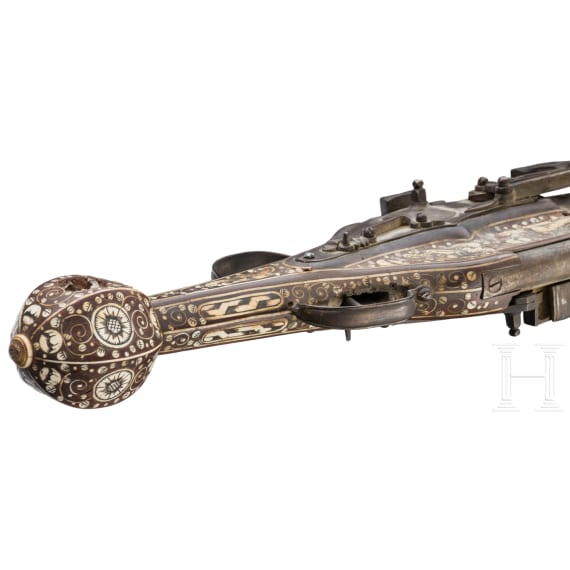A German Victorian double-barrelled wheelock pistol, in the style of circa 1610