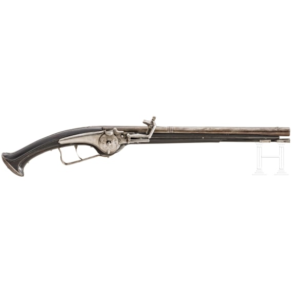 A German wheellock pistol with ebony stock, circa 1630