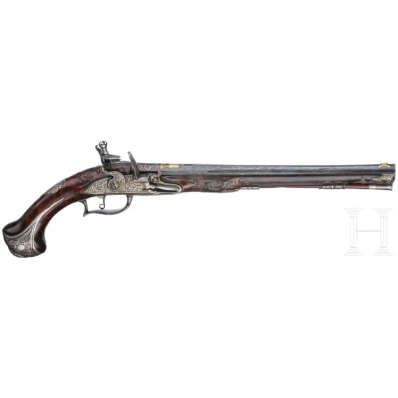 A fine pair of flintlock pistols from the armoury of the Duke of Bavaria, Charles Albert (1726-45), by Johann Gottfried Kolbe of Suhl, circa 1740