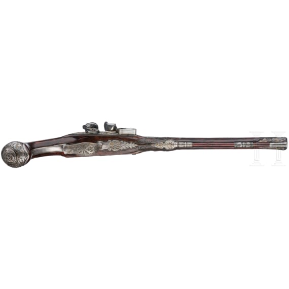 A fine pair of flintlock pistols from the armoury of the Duke of Bavaria, Charles Albert (1726-45), by Johann Gottfried Kolbe of Suhl, circa 1740