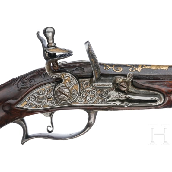 A fine pair of flintlock pistols from the armoury of the Duke of Bavaria, Charles Albert (1726-45), by Johann Gottfried Kolbe of Suhl, circa 1740